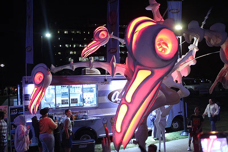 Close-Act Birdmen hang out around the food truck.